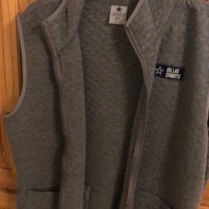 Never worn quilted vest.  Dallas Cowboys!